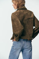 Brown leather bomber jacket with corduroy details and Zara flap pockets