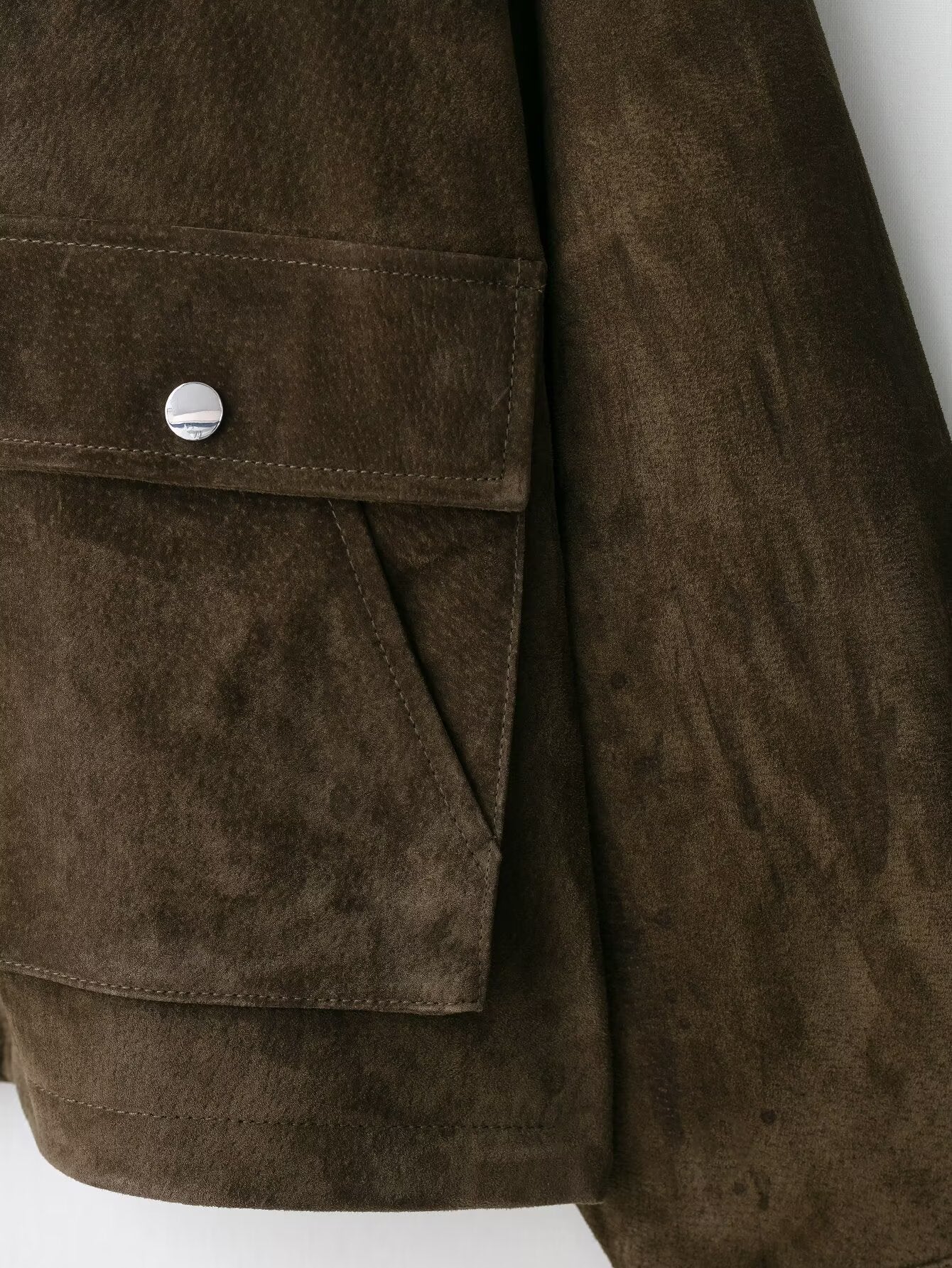 Brown suede leather bomber jacket with button closure and pocket detail