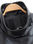 Retro faux leather jacket with high collar and button closure