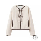 Cozy lace up cream sweater with black trim in Langry fashion