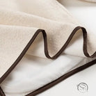 Cozy lace up coat with cream plush blanket, brown trim, Langry fashion