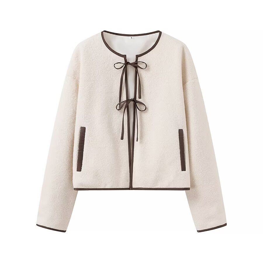 Cozy Langry lace-up coat in cream with black trim, fashion ملابس