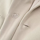 Langry fashion beige suede jacket with clear buttons and pocket detail