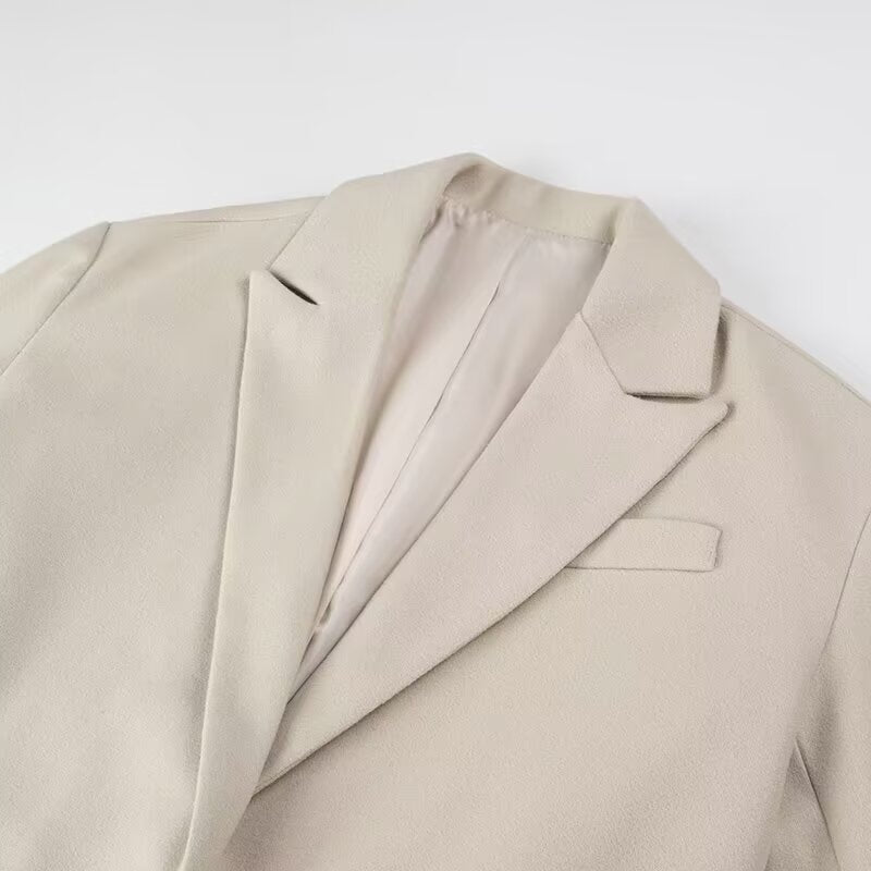 Langry fashion beige wool suit jacket with lapels, pockets, and tassel details