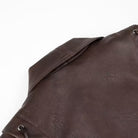 Langry faux leather jacket with brown drawstring backpack