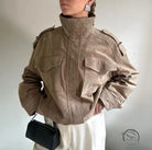 Elegant beige suede military jacket with high collar and patch pockets in langry fashion
