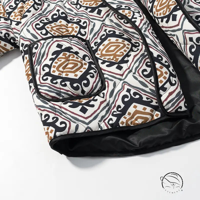 Black and white patterned sleeping bag with brown accents in Langry fashion coat