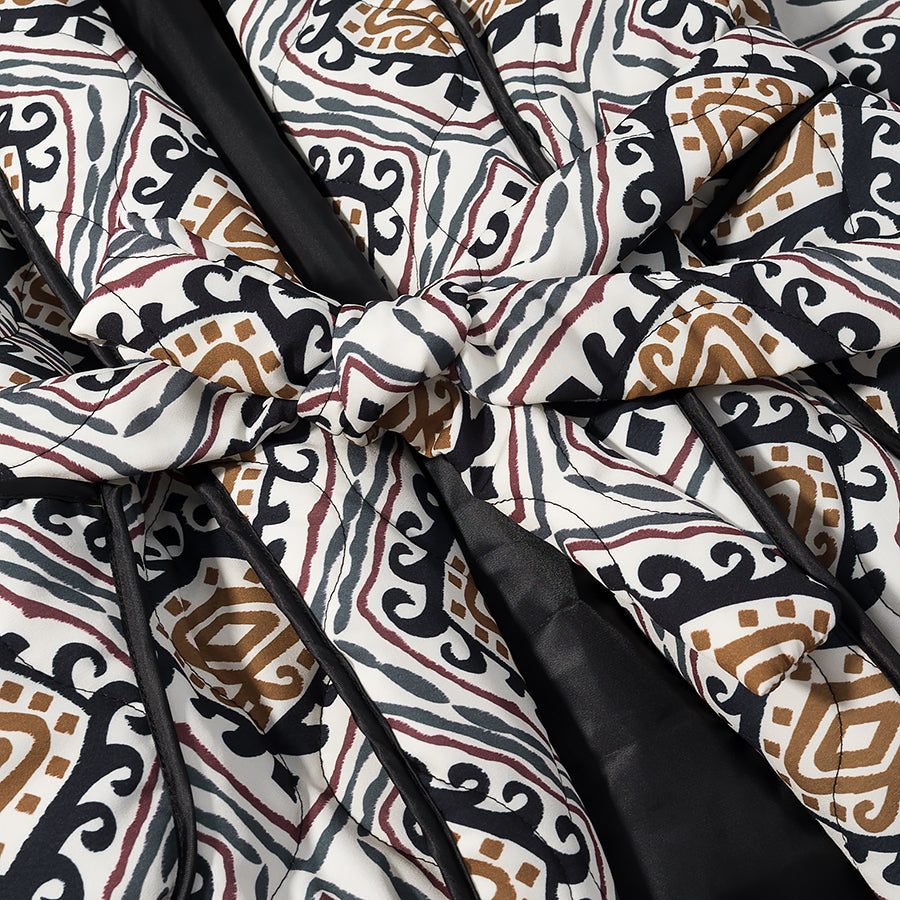 Langry fashion black and white patterned quilted jacket with brown accents