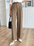 Beige high-waisted wide-leg Langry fashion pants with pleats and white flats