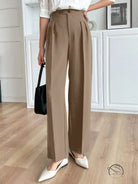 Beige high-waisted wide-leg langry fashion pants with pleats and white flats