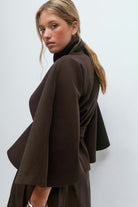 Graceful Langry fashion brown woolen cape coat with black turtleneck and layered skirt
