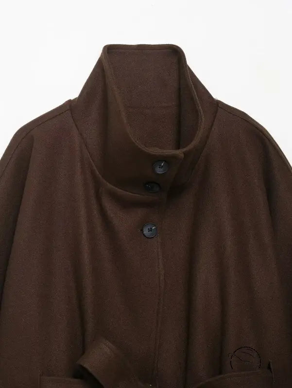 Brown woolen cape coat with high collar and button closure