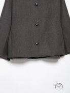 Charcoal gray textured blazer with fur effect neckline and black buttons