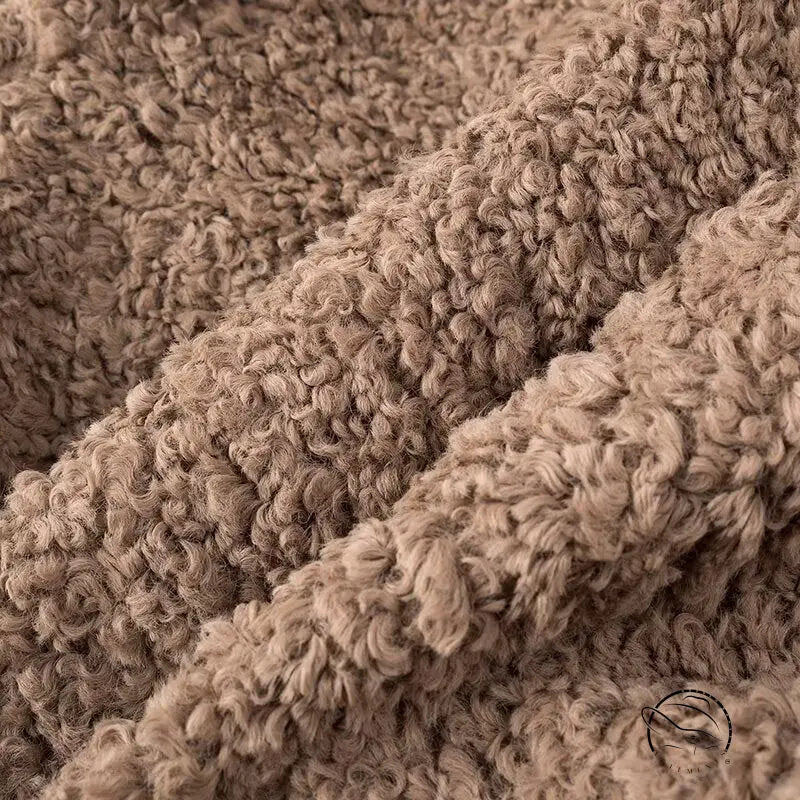 Casual big fur terry coat with beige textured throw blanket