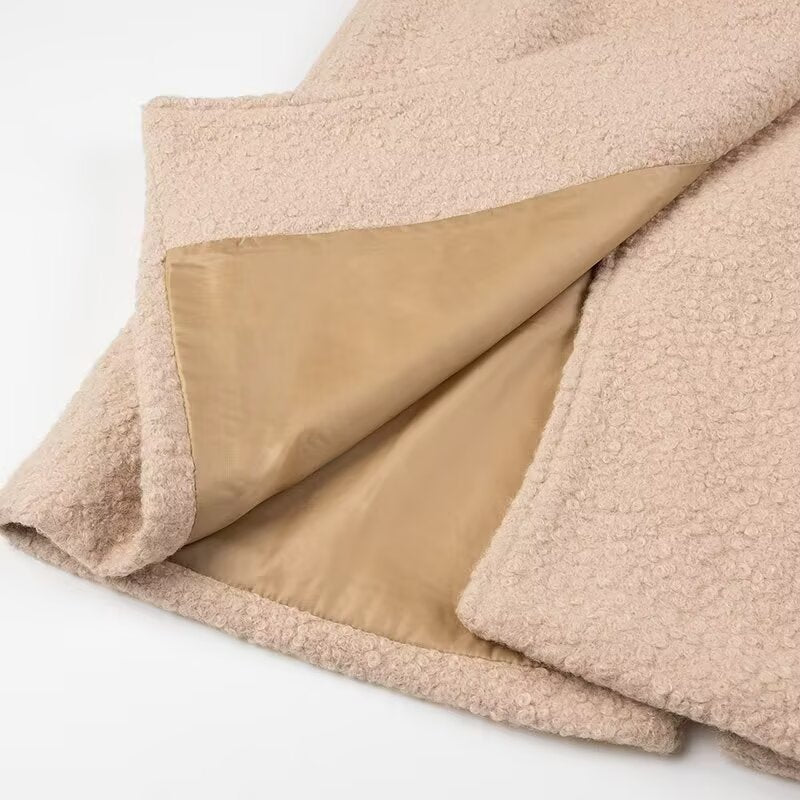 Beige sherpa blanket with satin backing in Langry double breasted overcoat