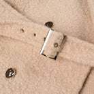 Beige textured terry woolen double breasted overcoat with silver buckle and buttons