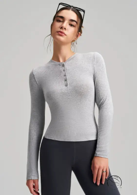 Sleek heather gray langry fashion top with ribbed texture and button neckline