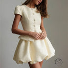 Enchanting short sleeve cream boucle dress with button front and flared skirt