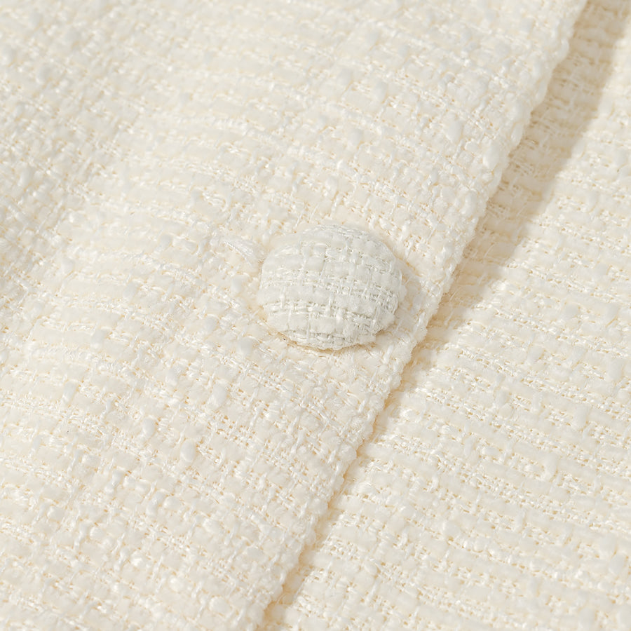 Cream textured short sleeve bud cardigan with button closure