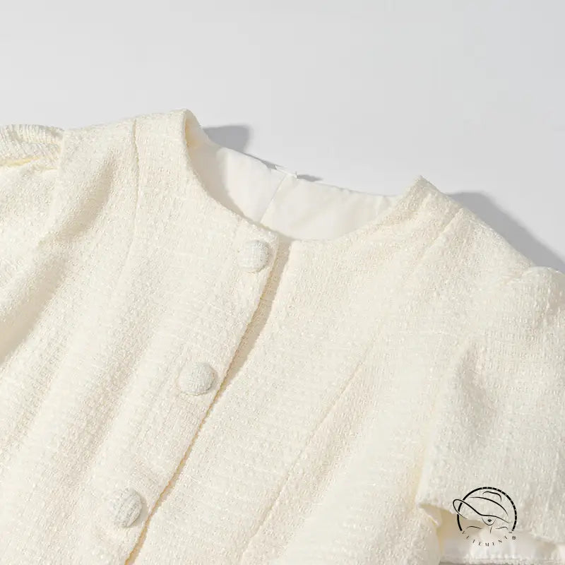 Enchanting short sleeve bud cream cardigan with round buttons and high neckline