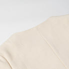 Langry fashion cream-colored textured sweater in classic short coat style