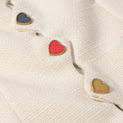 Heart-shaped buttons on Langry fashion cream sweater coat