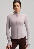 Long sleeve lavender zip-up yoga jacket with finger stall collar