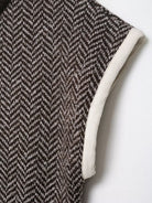Elegant langry fashion knitted wool vest in herringbone pattern with cream trim