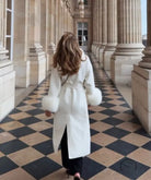 Elegant langry fashion white woolen long coat with big fur collar, black pants and high heels
