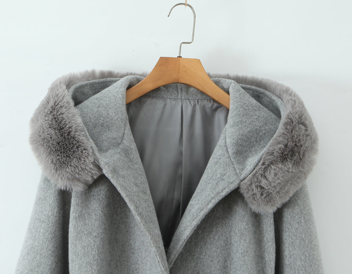Langry fashion winter mid-length woolen hooded overcoat in gray with fur trim on wooden hanger