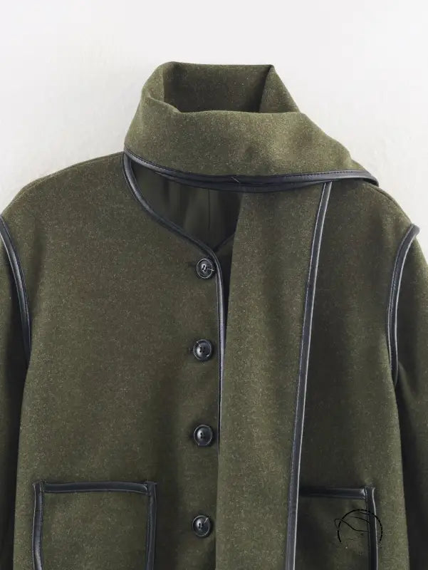 Langry olive green wool coat with black trim, military-inspired fashion