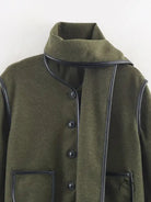 Langry olive green wool coat with black trim, military-inspired fashion