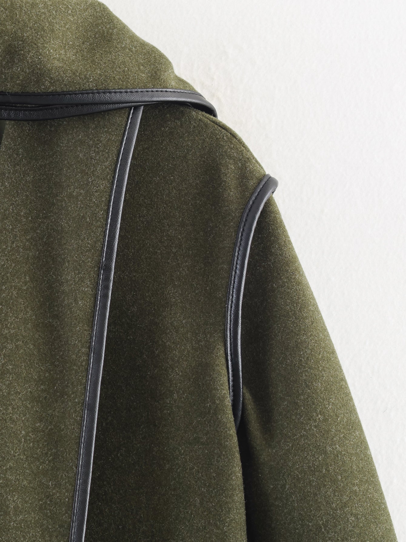 Olive green Langry wool coat with black leather accents and classic collar