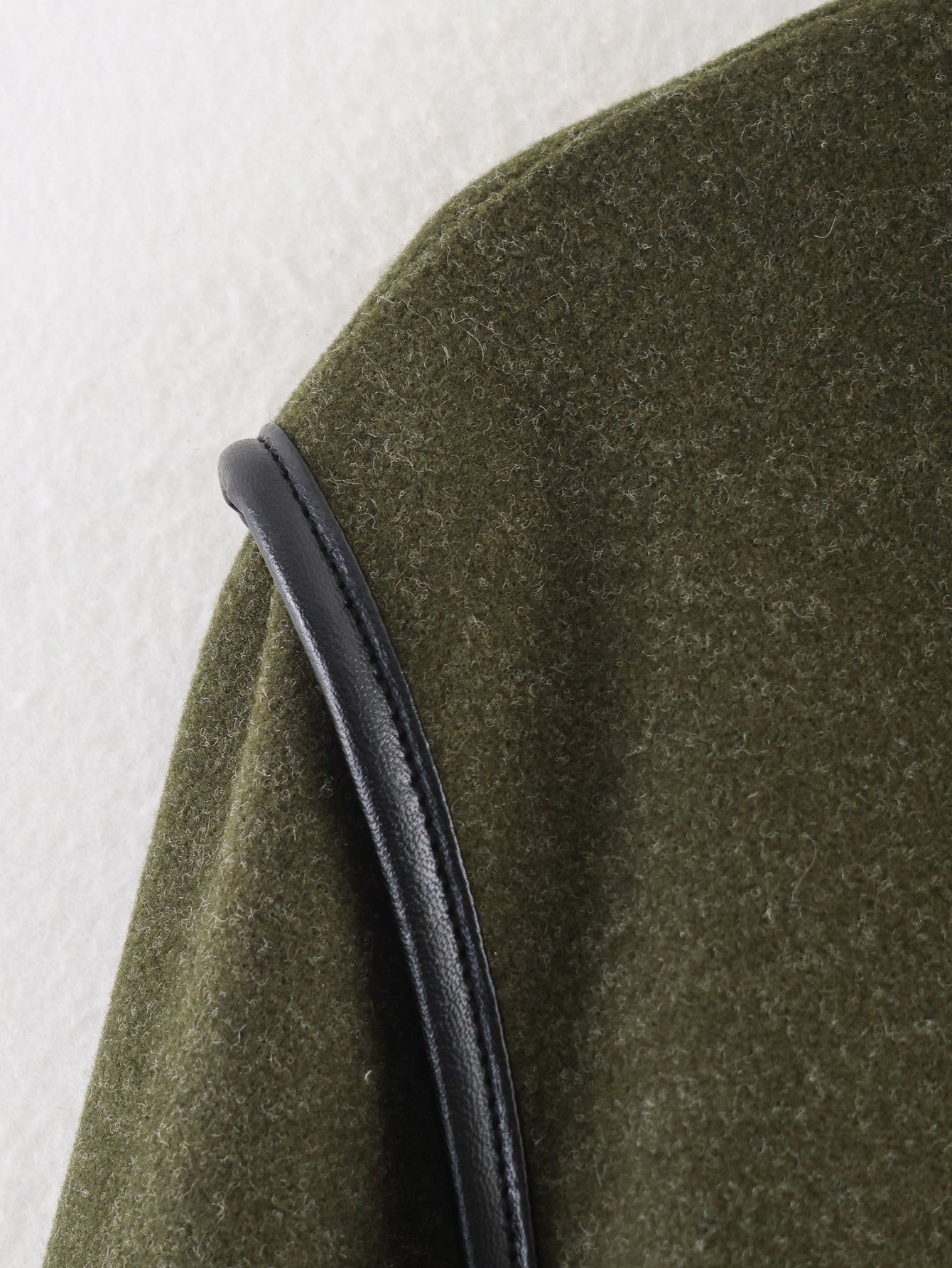 Langry fashion olive green textured woolen coat with black leather strap