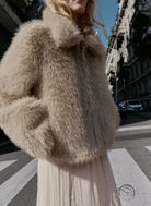 Fashionable beige faux fur wool jacket with high collar and long sleeves