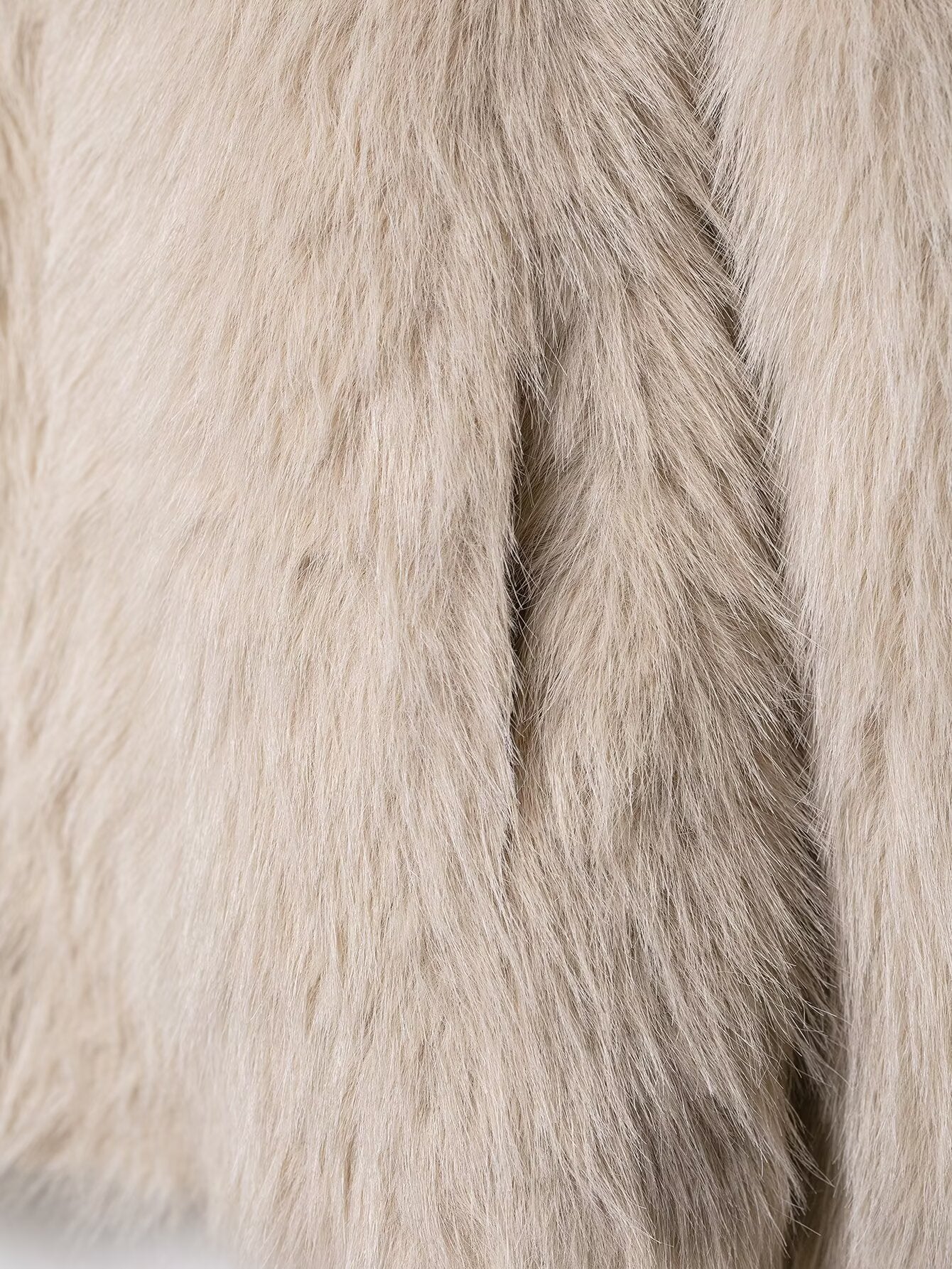 Luxurious beige faux fur Langry fashion coat with soft wool texture