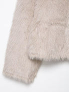 Fashionable beige faux fur langry jacket with plush texture