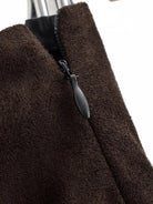 Brown suede jacket with silver zipper, black lining, paired with Langry fashion sheath skirt