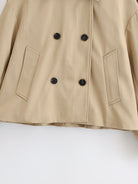 Enchanting Langry short khaki trench coat in beige with double-breasted buttons and patch pockets