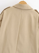Enchanting Capable Short Khaki Trench Coat in beige with double-breasted closure and epaulettes from Langry fashion ملابس