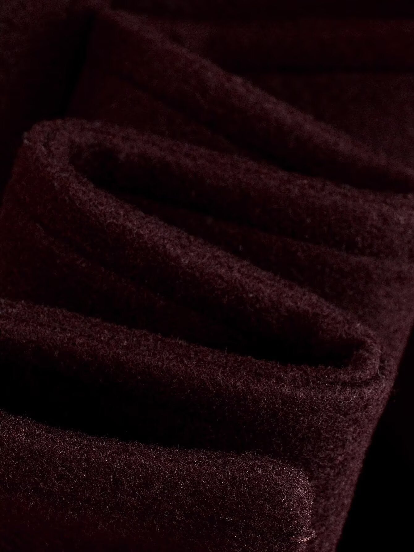 Dark red textured langry woolen overcoat with ribbed cuffs