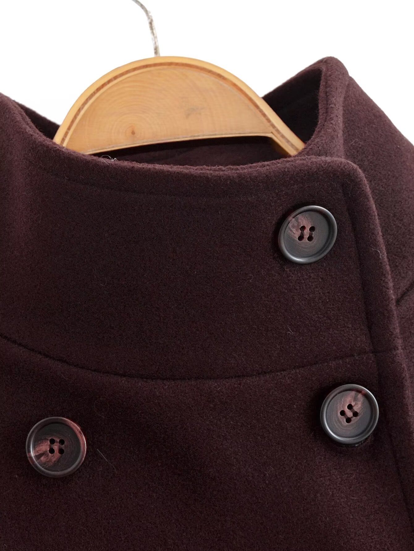 Brown double-breasted wool overcoat with silver buttons on wooden hanger, Langry fashion ملابس