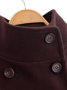 Brown double-breasted wool overcoat with silver buttons on wooden hanger, Langry fashion ملابس