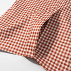 Terracotta and white gingham checkered fabric for Langry casual plaid trench coat