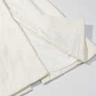 Langry fashion cream-colored silk pajama pants with elastic waistband and side pockets for cozy woolen coat