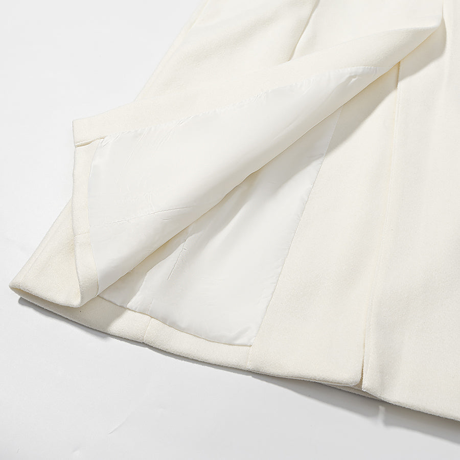 Langry fashion cream-colored woolen blazer with black stitching and pockets