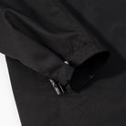 Black zippered pocket detail on Langry fashion trench coat