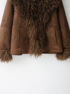 Elegant faux shearling autumn coat with fur lining and pockets