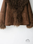 Elegant autumn fur effect coat in faux shearling with pockets