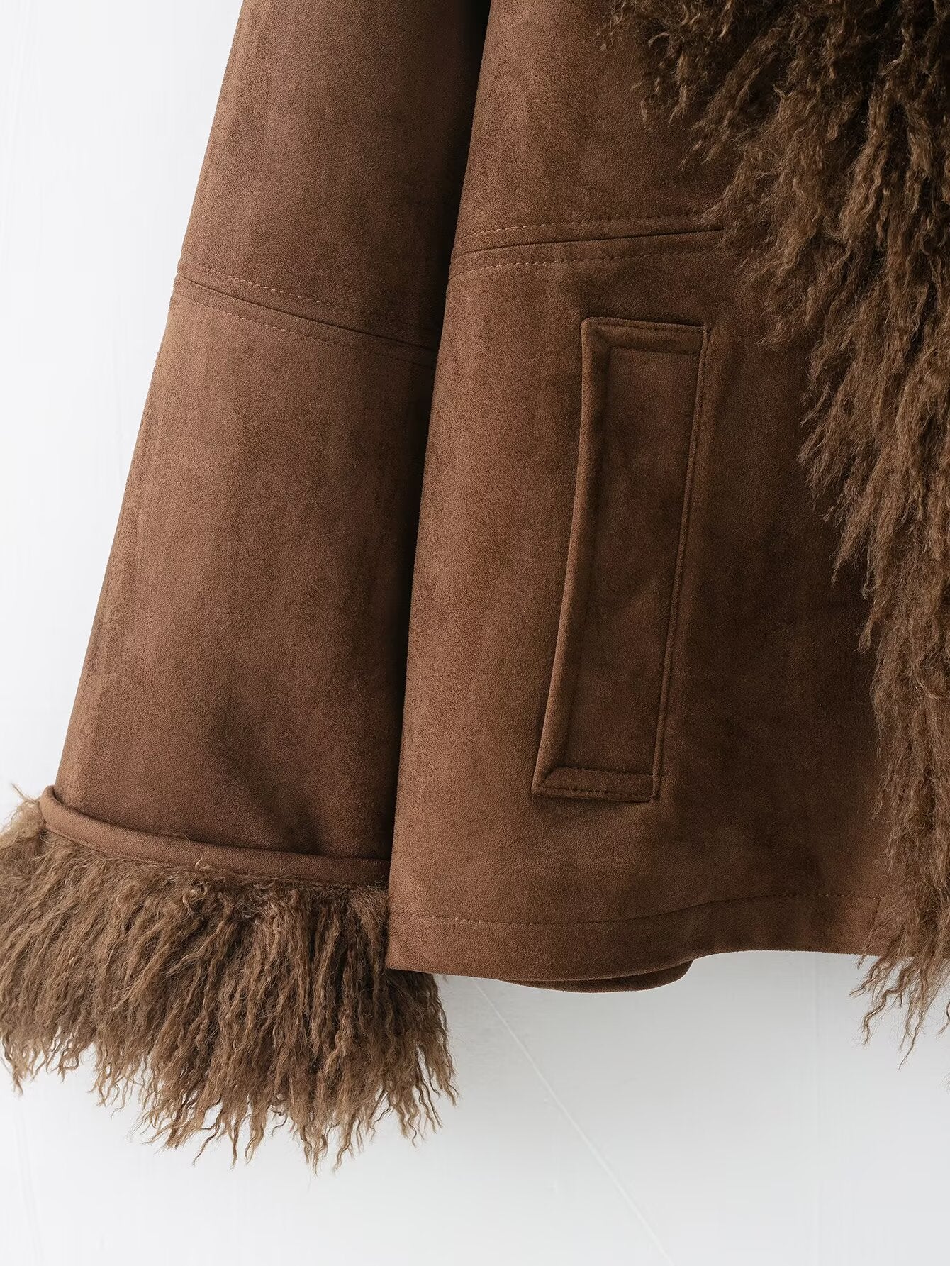 Elegant autumn faux shearling coat with fur trim and pocket detail